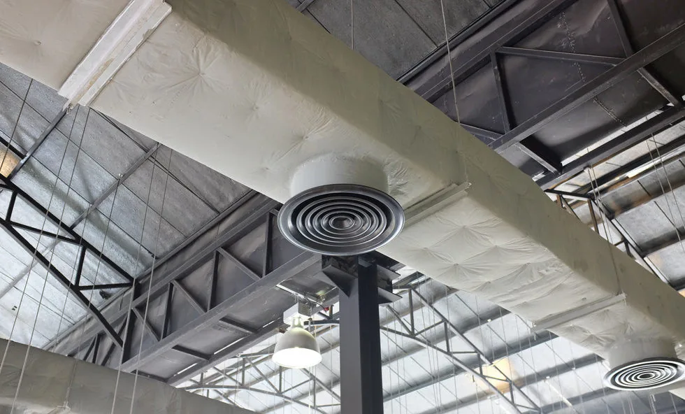 Pre-insulated PIR ducting and ceiling diffuser installed in a commercial building